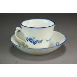 A Caughley coffee cup and saucer painted Chantilly Sprigs within an ozier border, circa 1785,