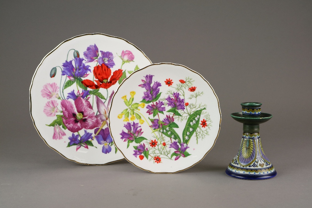 A set of nine Royal Albert Collectors plates decorated with flowers and a Gouda blue short