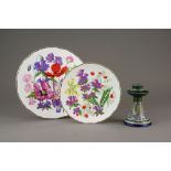 A set of nine Royal Albert Collectors plates decorated with flowers and a Gouda blue short