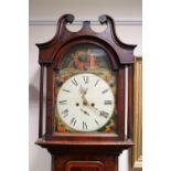 An early 19th century crossbanded mahogany cottage longcase clock with arched hood with broken