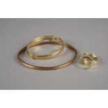 A 9ct gold hollow slave bangle, weight 6g,