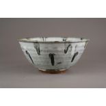 A Jim Malone stoneware bowl, of wide and gently ribbed funnel shape with inset foot ring,