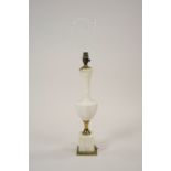 An octagonal alabaster and gilt metal mounted table lamp in classical style, fitted for electricity,