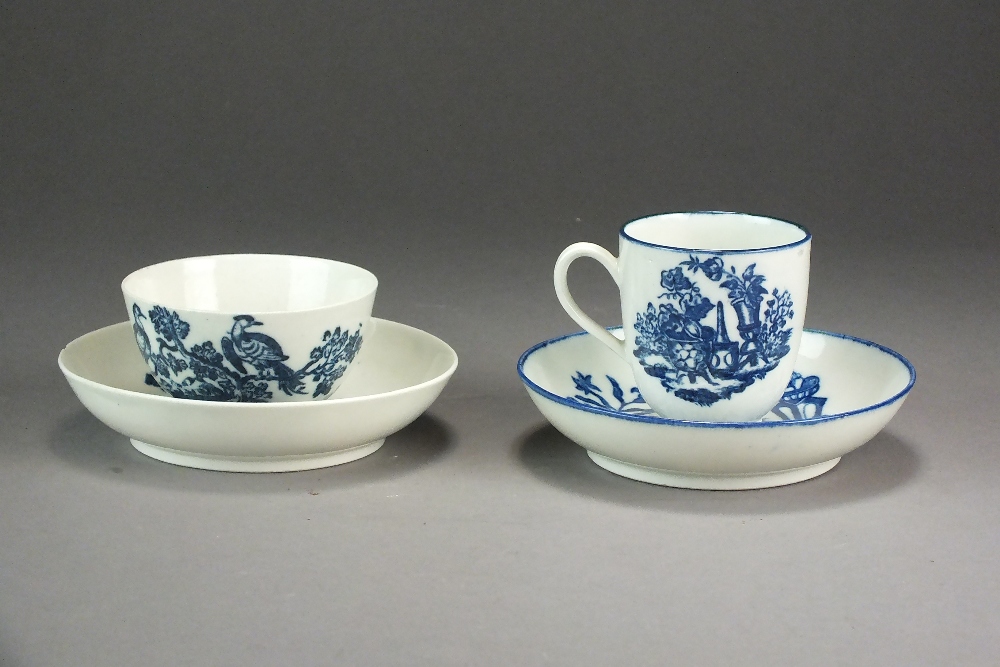 A Caughley tea bowl and saucer transfer-printed with the Birds in Branches pattern, circa 1785,