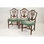 A set of five Hepplewhite style shield back mahogany dining chairs, 19th century,