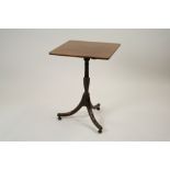 A mahogany tilt top tripod table part George III,