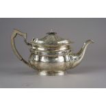 A silver teapot, Jay, Richard Attenborough Co Ltd, Sheffield, 1908, of shaped oval form,