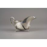 A large silver sauce boat, Barker Brother Silver Ltd, Birmingham 1929,