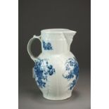 A Caughley mask head cabbage leaf jug transfer-printed in the Three Flowers pattern, circa 1785,