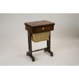 An early Victorian rosewood and ivory inlaid combined work and games table the rectangular fold