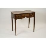 A George III oak side table or low boy,