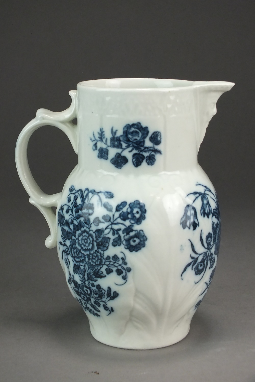 A small Caughley cabbage leaf mask head jug transfer-printed in the Bouquets pattern, circa 1785,