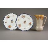 A set of twelve English porcelain cabinet plates decorated with flowers in polychrome,