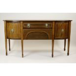 A George III style satinwood crossbanded mahogany D-shaped breakfront sideboard with central frieze