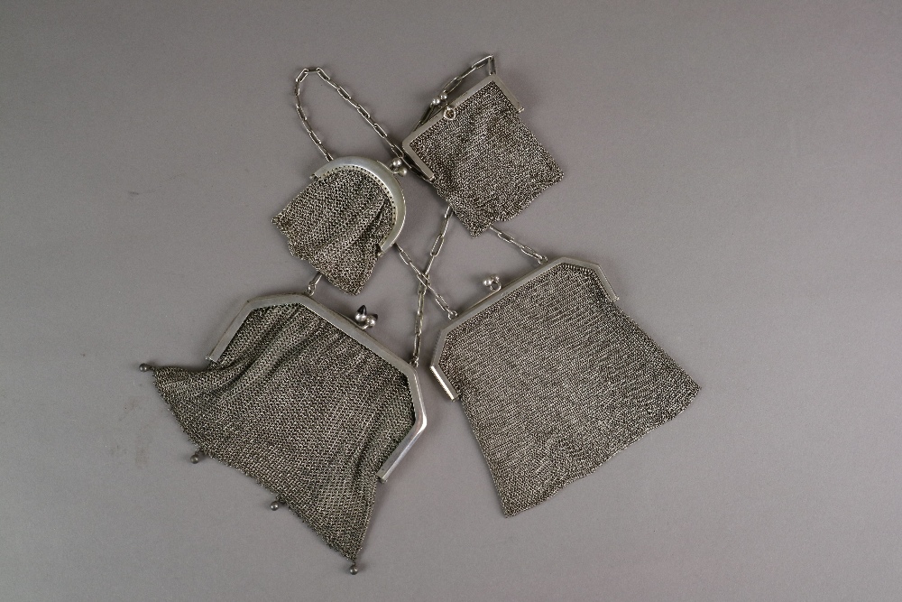 A silver mesh purse, London Chain Bag Co Ltd, London 1926, together with a further small examples,