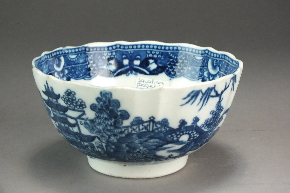 A Caughley slop or waste bowl transfer-printed in the Birds in Branches pattern, circa 1785,