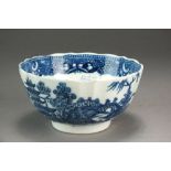 A Caughley slop or waste bowl transfer-printed in the Birds in Branches pattern, circa 1785,