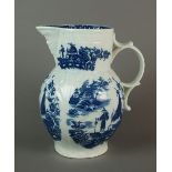 A large Caughley mask head cabbage leaf jug transfer-printed in the Pleasure Boat pattern,