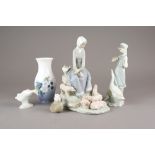 Two trays of Lladro, Lladro style and Royal Copenhagen porcelain figures,