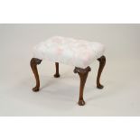 A George I style walnut framed footstool,