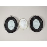 A collection of three late 18th century milk glass cameos,