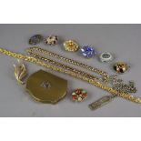 A large collection of various pieces of costume jewellery to include paste set brooches,