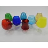 Eight various decorative coloured glass oversized decorative glasses,
