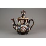 A large dated Measham barge ware teapot and cover, inscribed William Edge, 1888,