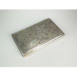 A white metal cigarette case