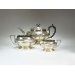 A three piece silver tea service