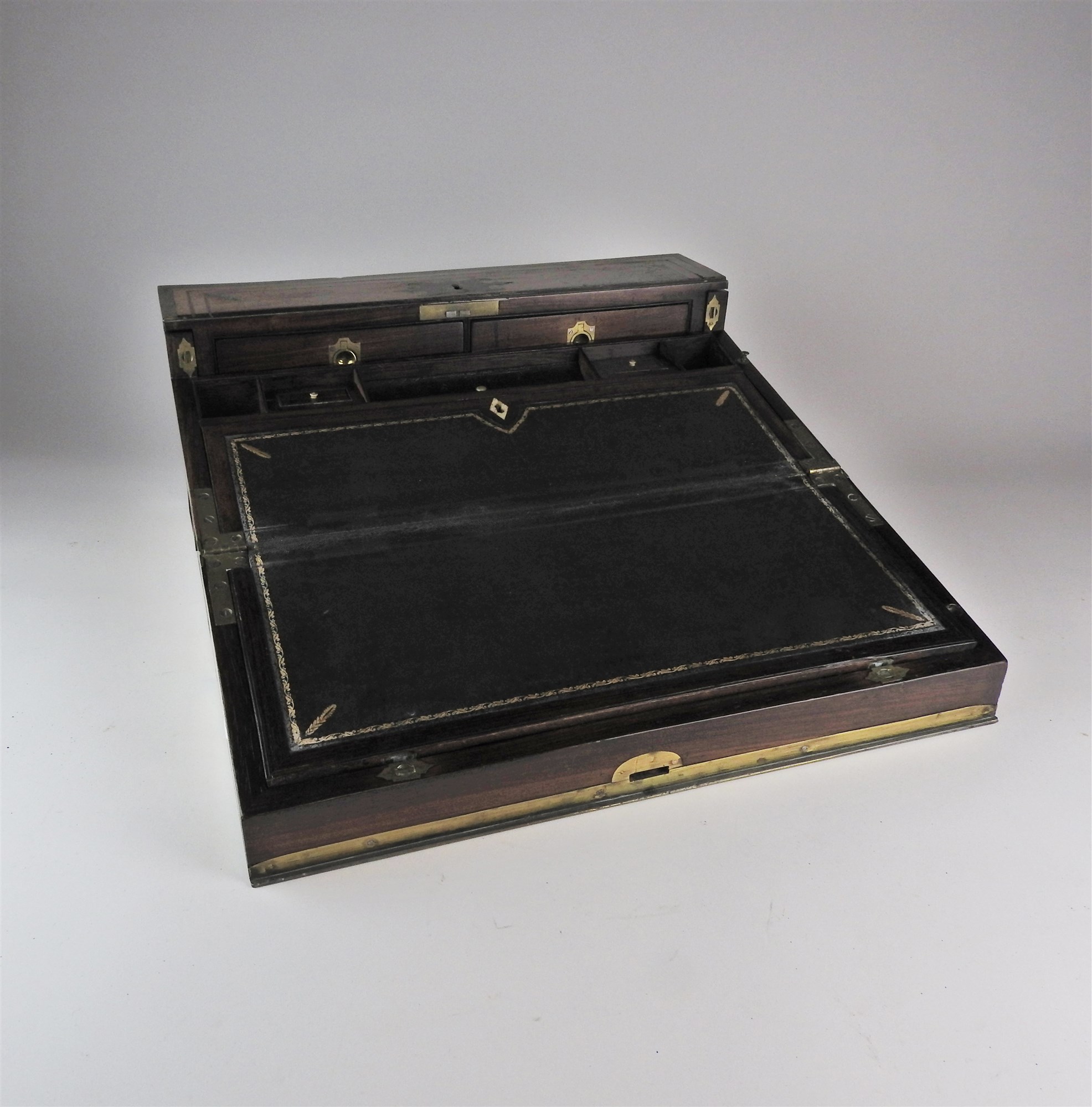 A rosewood and brass mounted campaign lap desk, mid 19th century