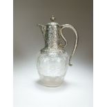 A silver mounted claret jug