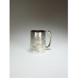 A silver Christening mug