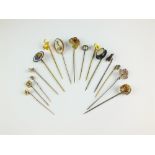 A collection of fifteen stick pins