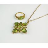 A 9ct gold peridot ring and pendant