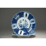 A Caughley powder blue fluted plate in the Holed or Flaming Rock design, circa 1778-80, C mark,