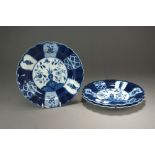 Three Caughley powder blue fluted plates painted with the Holed or Flaming Rock Design,