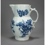 A Worcester porcelain cabbage leaf mask jug transfer-printed in the Three Flowers pattern,