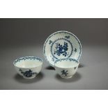 A Worcester porcelain tea bowl and saucer in the Fruit and Wreath pattern, circa 1790,