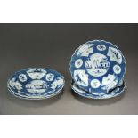 Four Caughley lobed plates painted with a fan-panelled landscape within powder blue ground,