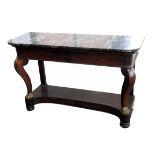 A William IV mahogany side table the later variegated black marble top above a semi-secret full