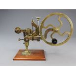 A 19th century Swiss watchmakers' topping tool, unsigned, with hand wheel and one cutter,