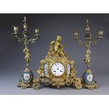 A French Louis XV style gilt metal and porcelain inset clock garniture, 19th century,