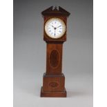 An early 20th century French inlaid mahogany miniature longcase clock with calendar,