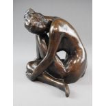 A patinated bronze study of a nude woman, by Ian Milner,