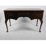 A cross banded walnut side table, 18th century and later,