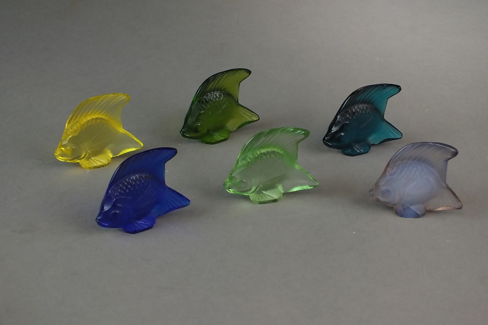 A collection of Lalique glass models of fish, post war, coloured, clear frosted and some opalescent,