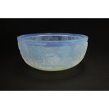 A Sabino opalescent glass bowl, circa 1930s, decorated in relief with maidens holding flowers,