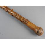 A Welsh folk art walking stick carved on a sash 'God is Love' made 1925 Duw Cariad Yw carved with