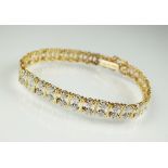 A 9ct gold diamond set bracelet,